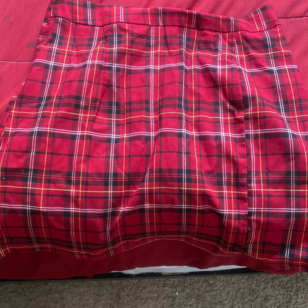 Split short plaid skirt.